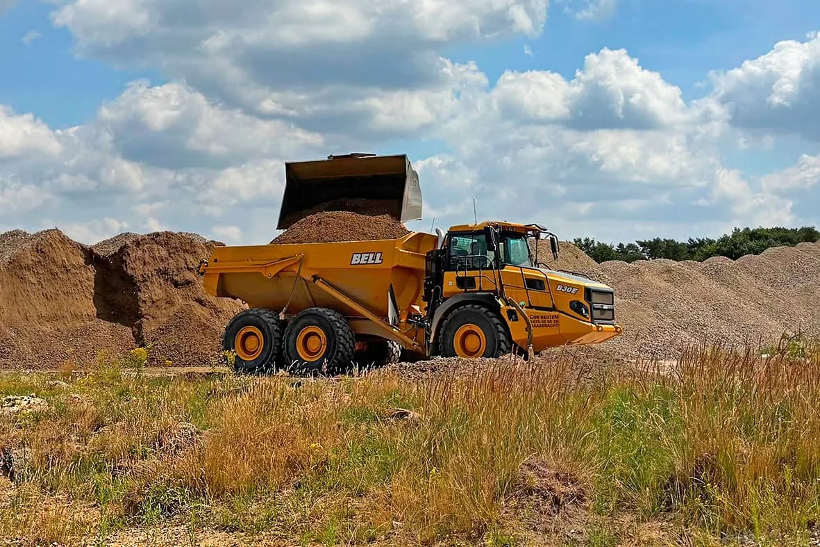 Articulated dump truck on a haul road