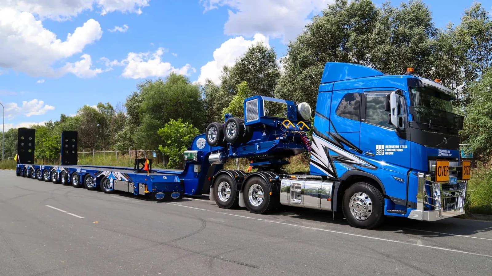 Low loader float carrying machinery