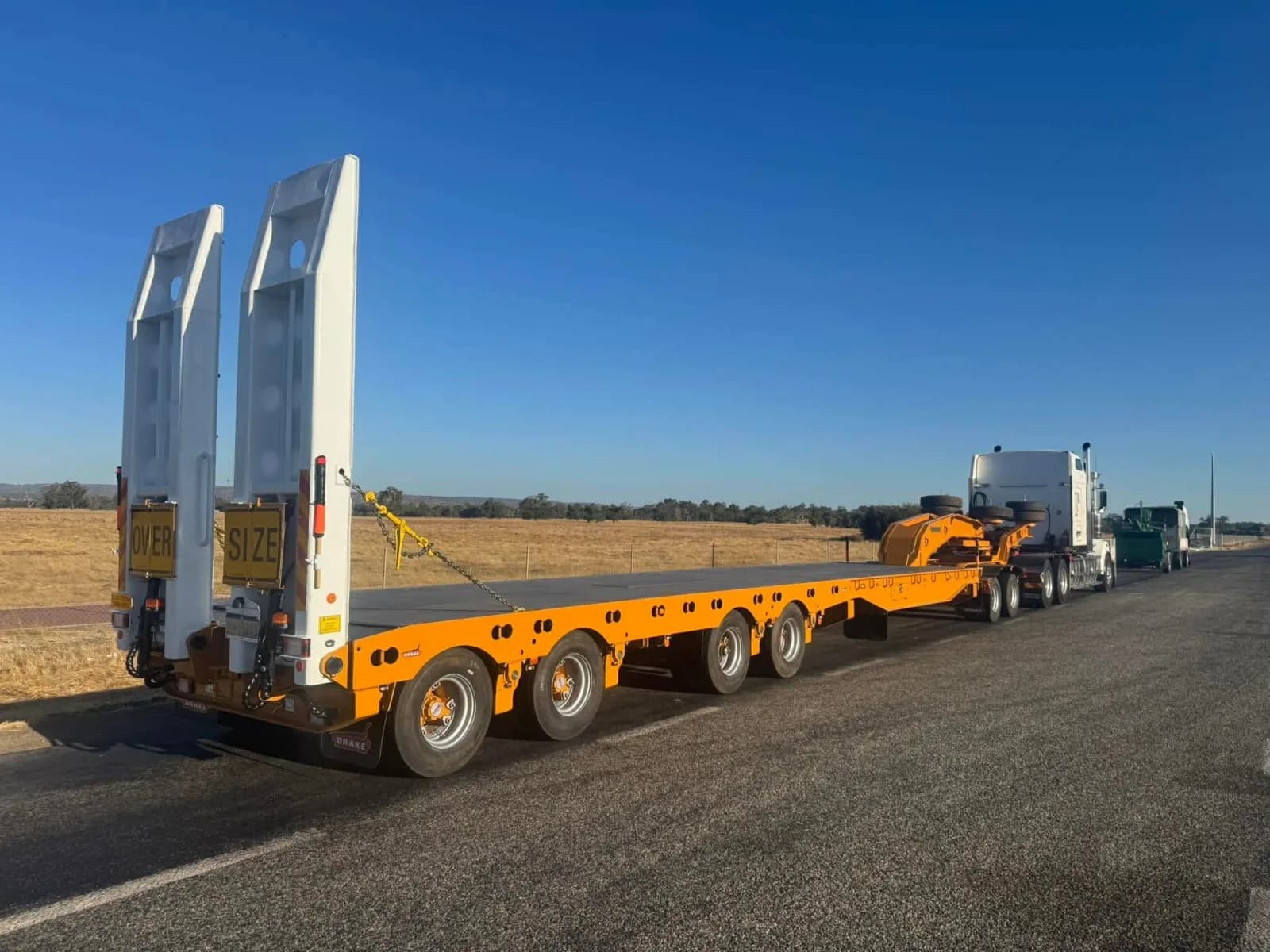 Low loader on the road